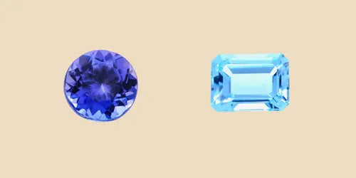 Round-cut tanzanite and emerald-cut blue topaz side by side on a beige background